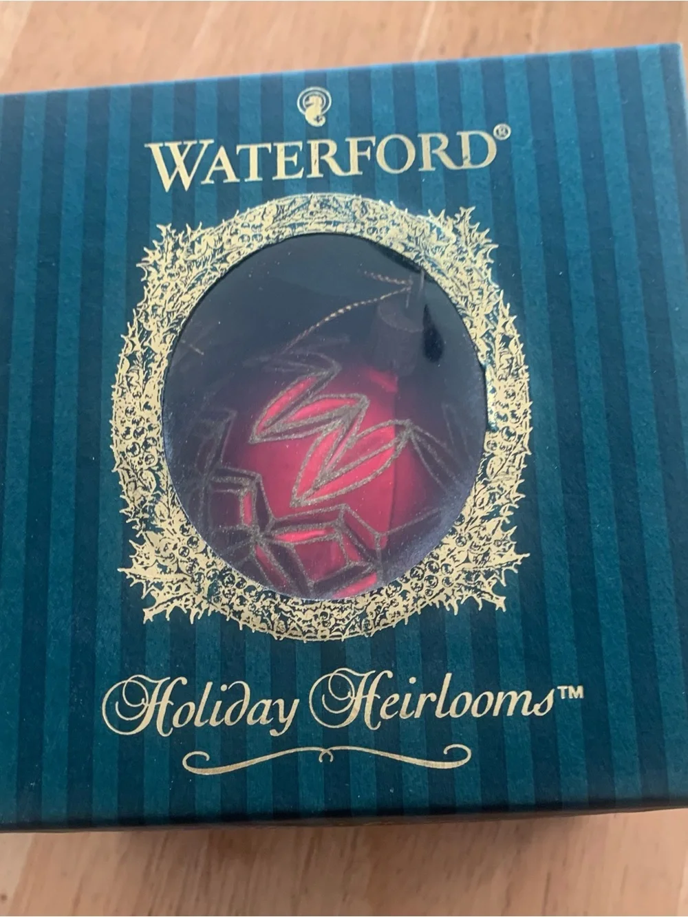 Waterford Red Glass Ornament with Gold Glitter Accents with PGA Logo.